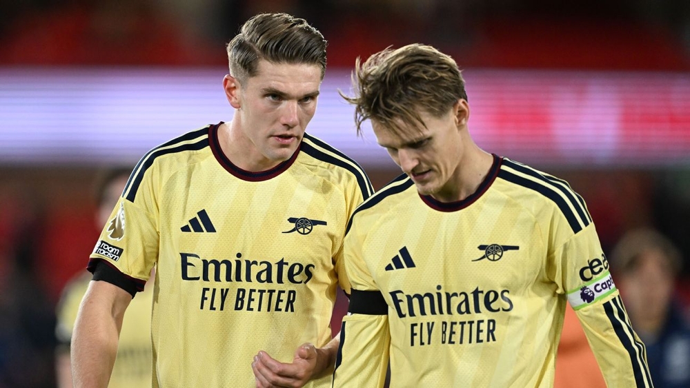img of Arsenal say they will 'attack' Premier League title:...